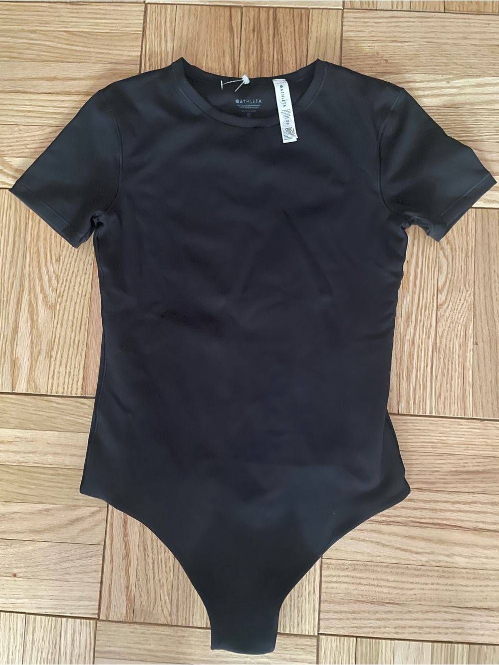 Athleta Kids Black Short-Sleeve One-Piece Bodysuit